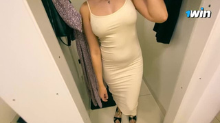 Talking, shopping, picking out a dress for a Russian sweety.