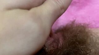 Giant pulsating clitoris climax in extreme close up with squirting hairy cunt grool play