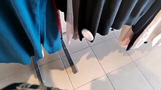 Your mom goes to a clothing store and puts her panties inside her vagina while she tries on some jeans