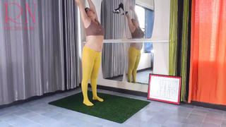 Regina Noir. Yoga in yellow tights doing yoga in the gym. A chick without panties is doing yoga. An athlete trains in a p