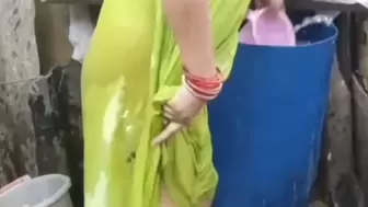 Young water cleaner attractive aunty in village house