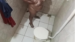 Secret webcam in the bathroom catches chubby stepmother